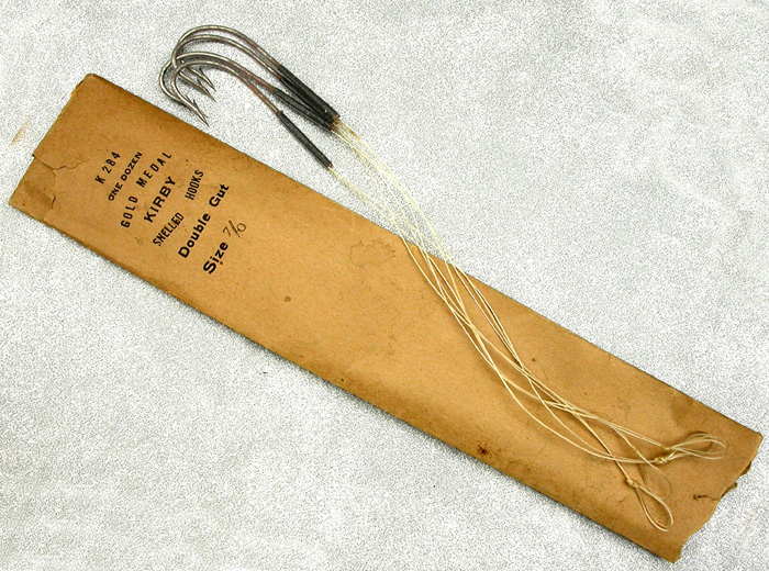 22. Gold Medal kirby hooks, 7.0, tinned but the tin is almost gone and there is surface rust, double gut, kirby. 