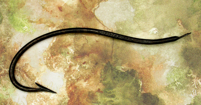 36a  John James & Sons. This hook is embossed with “Made by J. James & Sons on one side and Victoria Works, Redditch on the other. It is bout 3 7/8” long and has a gape of about 1 ¼” directly above the point. It is in remarkable shape with much of the original japan still in tact.