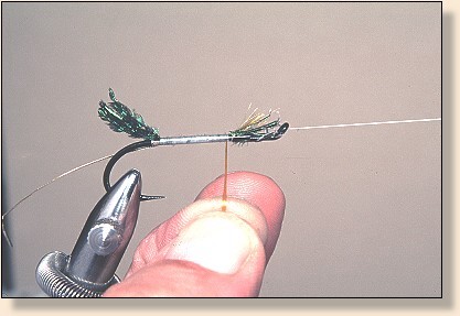 Floss tied in and flattened.
